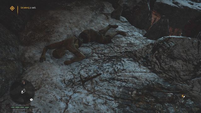 Скриншот клетки с крюком-кошкой около трупа в пещере для побега в миссии «В земли Удам»